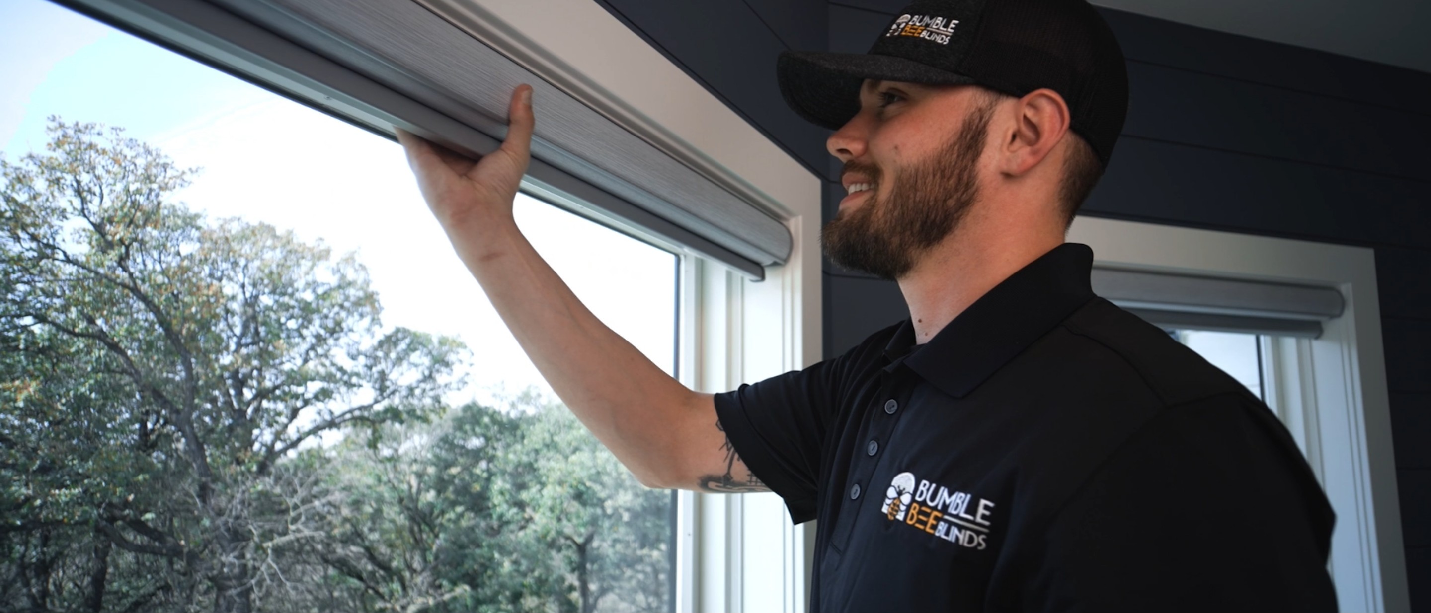 Bumble Bee Blinds technician installing shutters