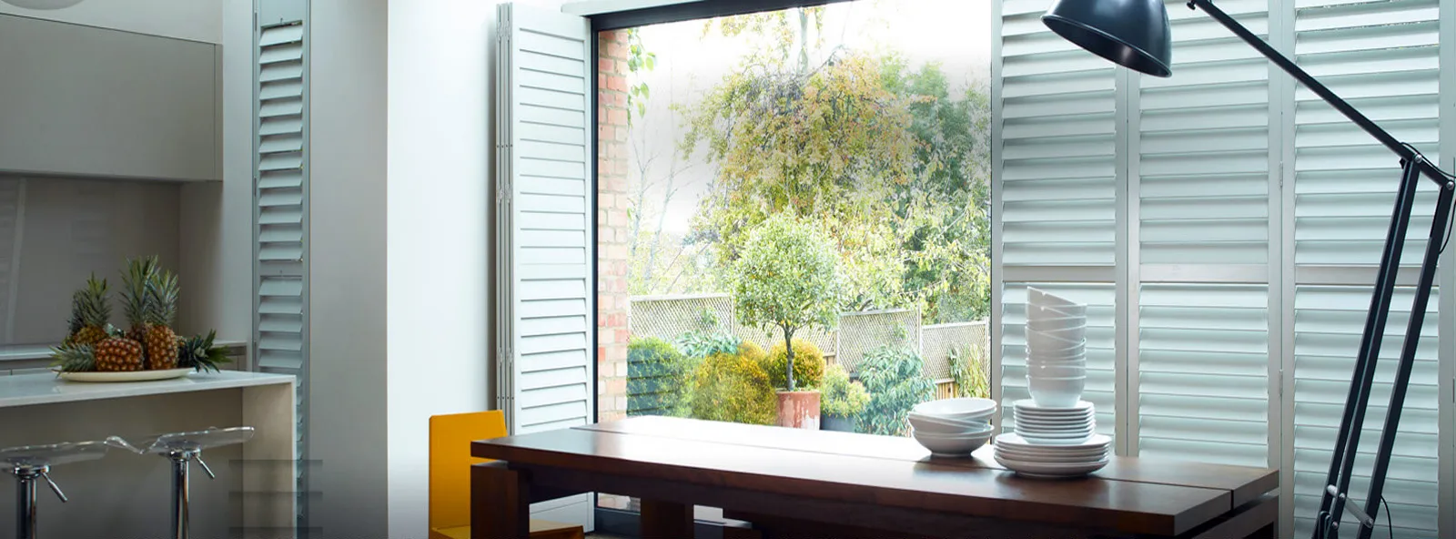 Shutters installed along great room sliding door