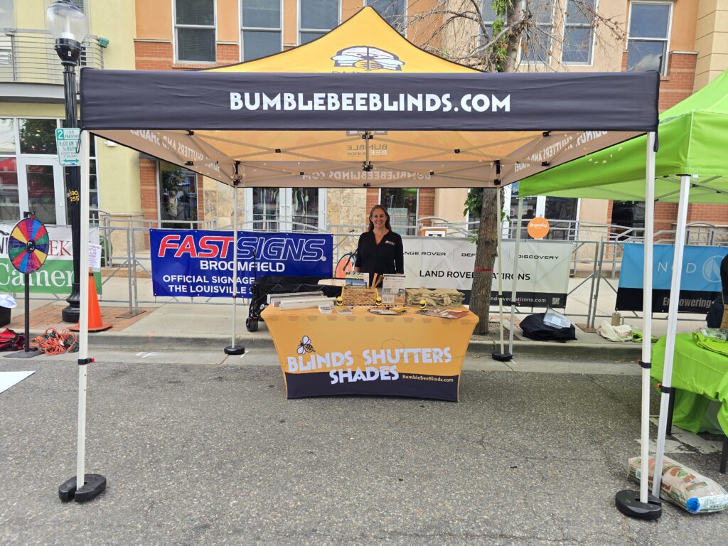 bumble bee blinds tent in a street