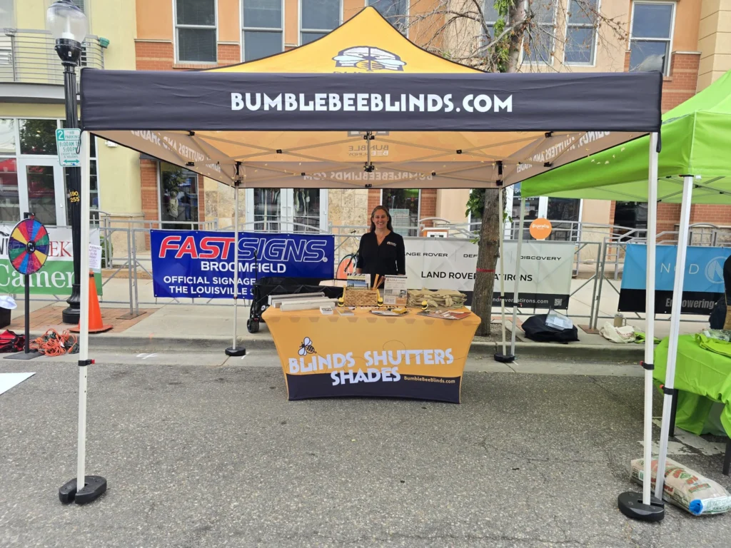 bumble bee blinds tent in a street