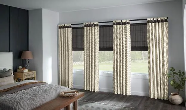 A bedroom with a bed and windowsAI-generated content may be incorrect.