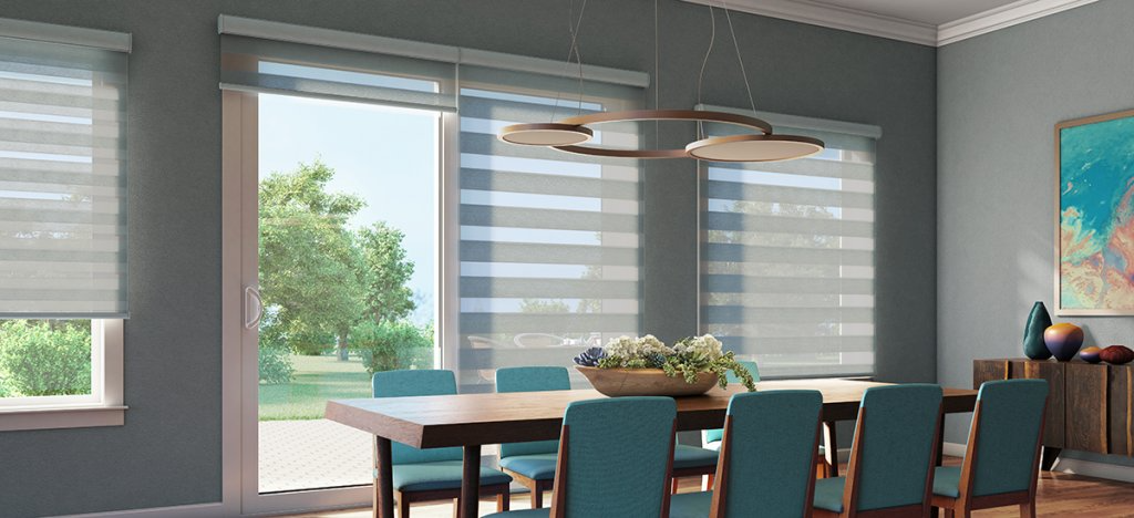 Grey banded shades on windows and sliding door in dining room