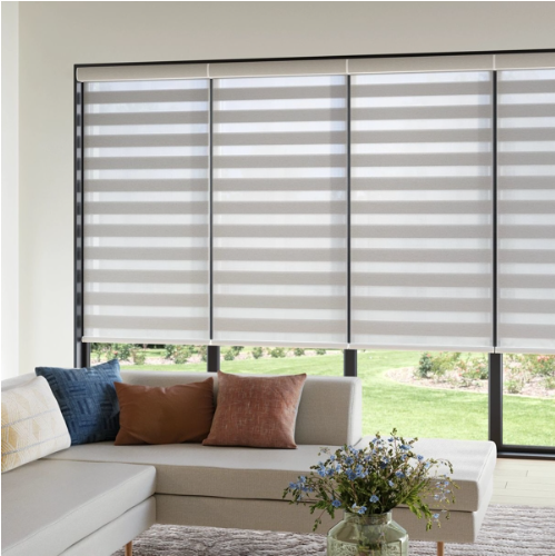 A couch in a room with a vase of flowers
AI-generated content may be incorrect.