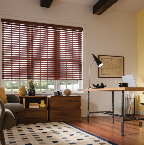 A room with a couch and a desk
AI-generated content may be incorrect.