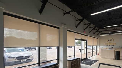 light filtering roller shades in a Pilates studio added for privacy and shade