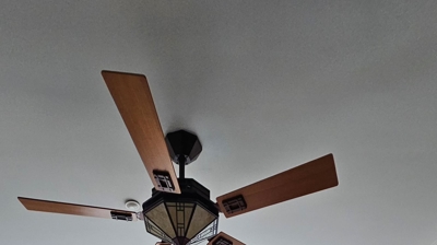 Solar shades filtering Texas sunlight in a West Lake Hills living room.