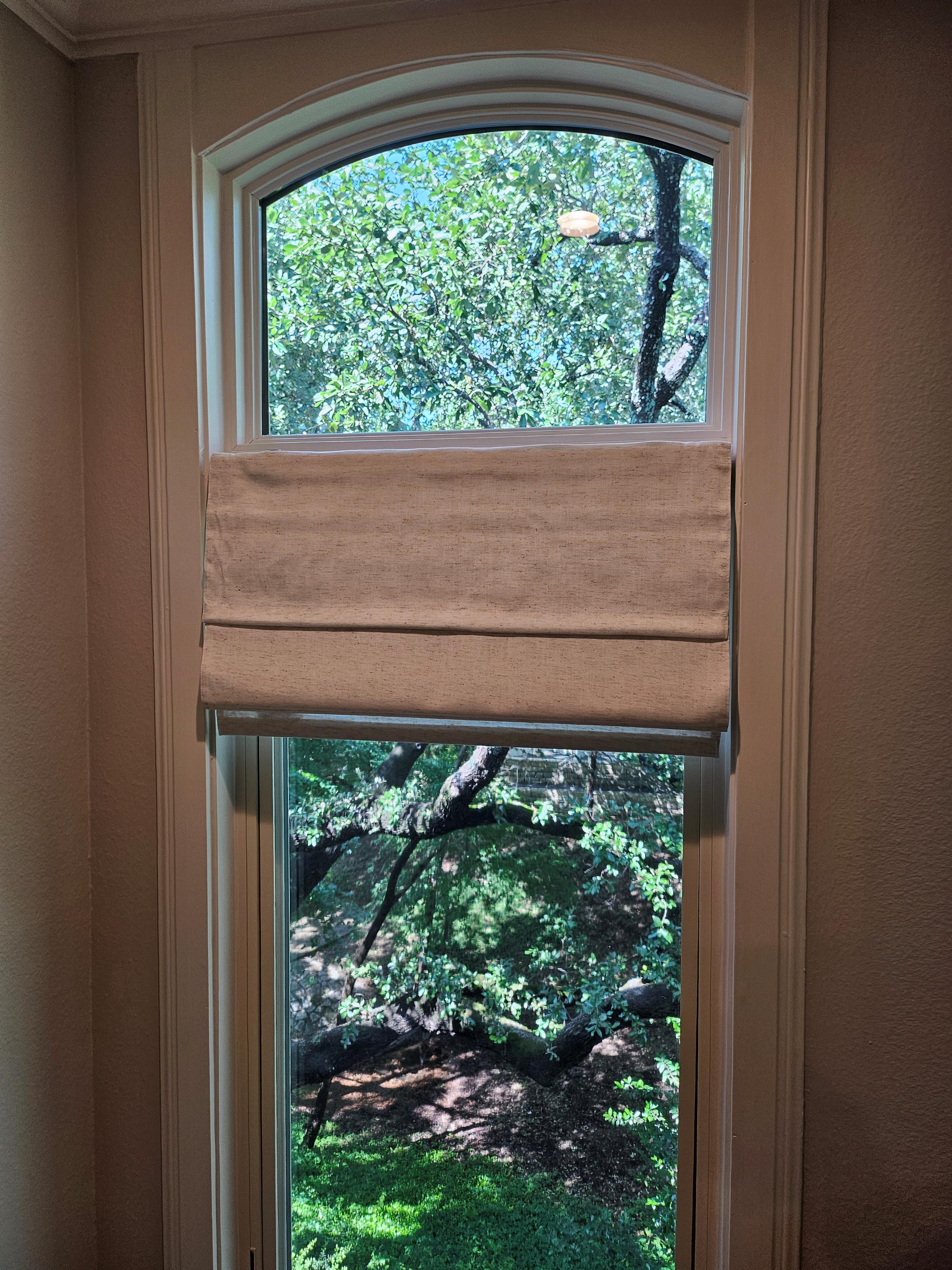 Roman Shade Framing Nature in Clarksville