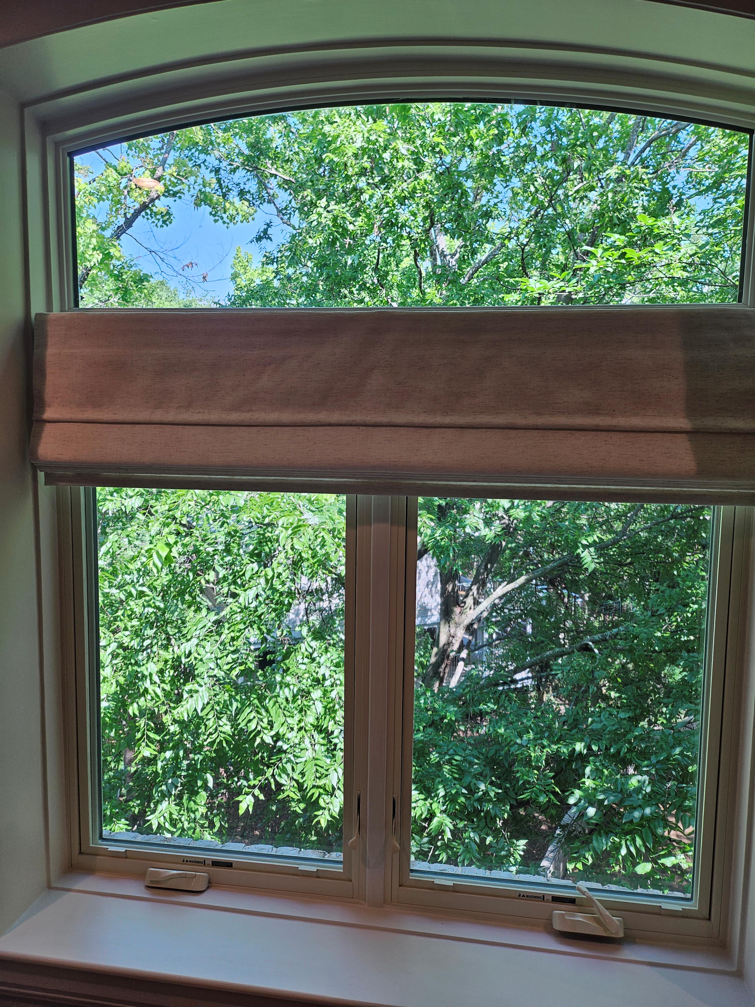 Cozy Window Pairing with Roman Shades