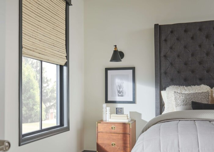 Room featuring natural woven shades
