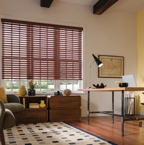 A room with a couch and a deskAI-generated content may be incorrect.