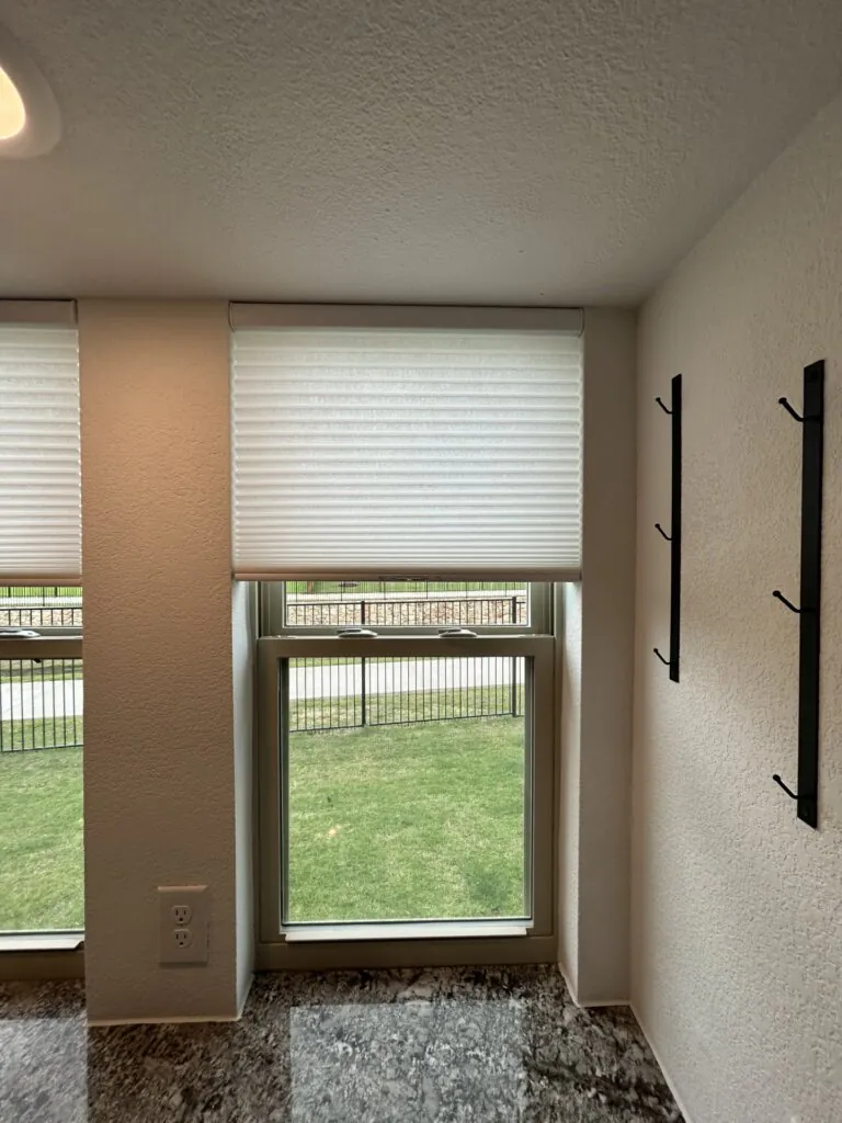 Cellular shades installed in a Rockwall TX home helping block Texas heat and improve energy efficiency