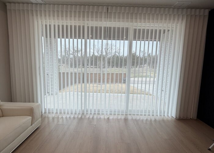 SmartDrape window treatment installed on a sliding glass door in a modern Rockwall home