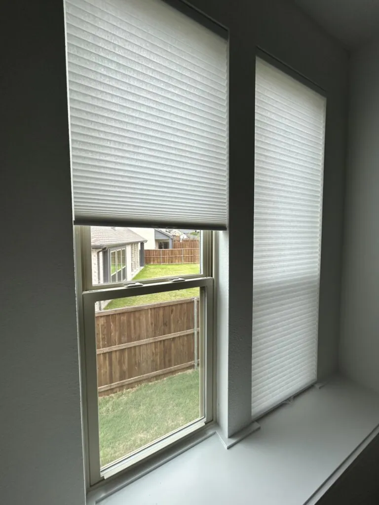 Energy-efficient cellular shades in a newly built Rockwall home