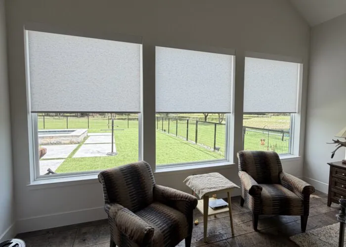 Custom light filering window treatments installed in a new construction home in Rockwall, TX