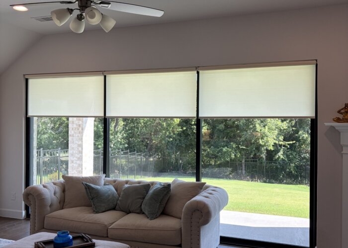 custom motorized roller shades in a home in fate texas