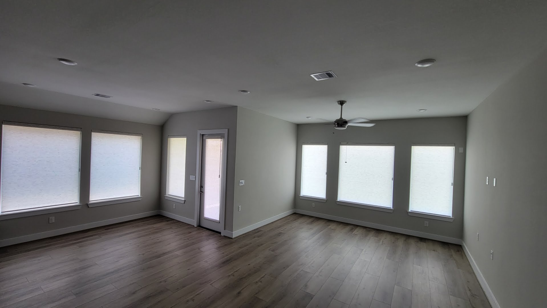 Residential Living Room Alta Roller Shades Installation in Richmond Tx